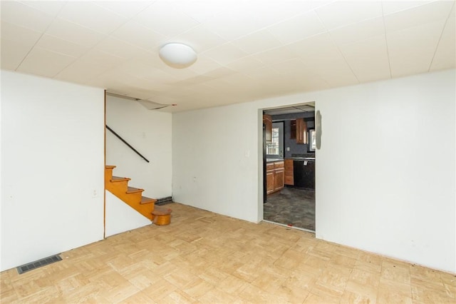 basement with light parquet floors