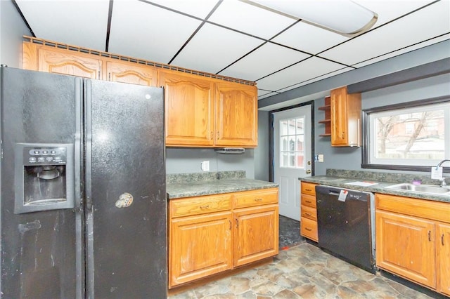 kitchen featuring sink and black appliances