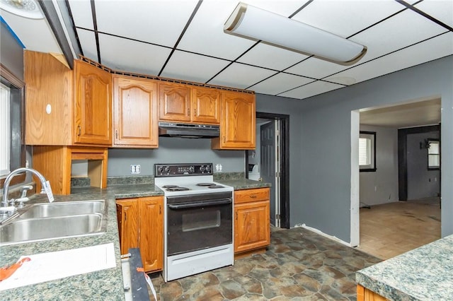 kitchen featuring white electric stove, dark wood-type flooring, and sink