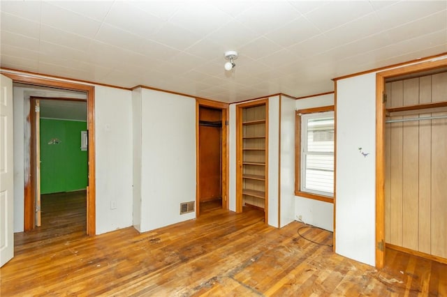 unfurnished bedroom with light hardwood / wood-style floors