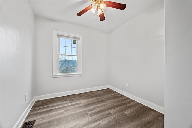 unfurnished room with ceiling fan and wood-type flooring