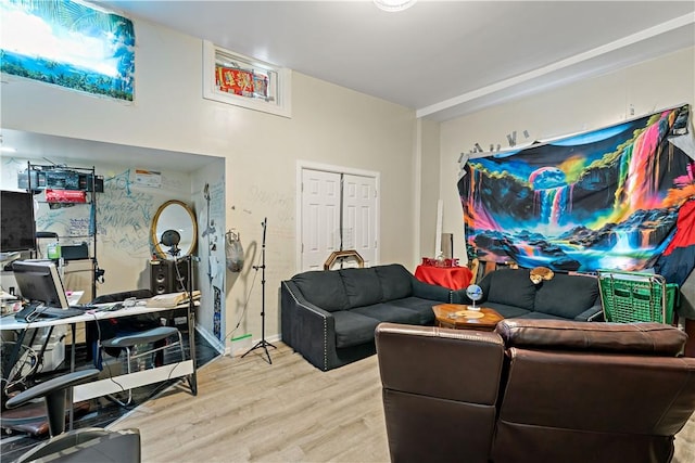 living room with light hardwood / wood-style flooring