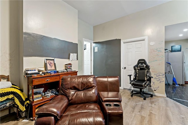 office space with light hardwood / wood-style floors