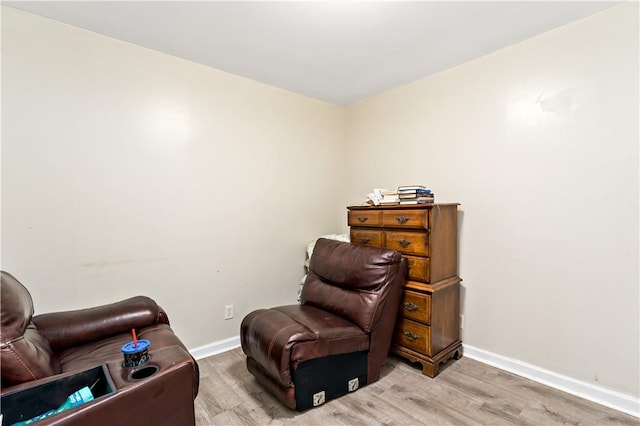 living area with wood-type flooring