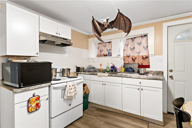 kitchen with backsplash, crown molding, light hardwood / wood-style flooring, white range with electric stovetop, and white cabinetry