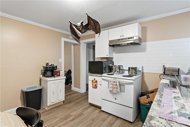 kitchen featuring white range with electric cooktop, crown molding, light hardwood / wood-style flooring, decorative backsplash, and white cabinetry