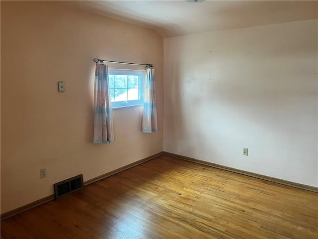 empty room featuring light hardwood / wood-style floors