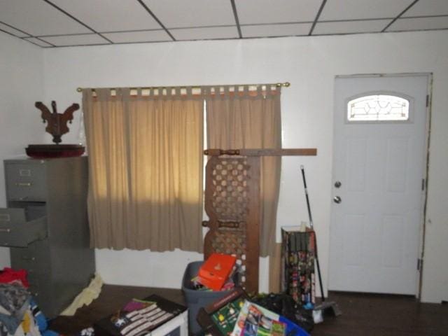 interior space featuring a paneled ceiling