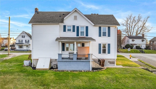 view of front of home with a front yard