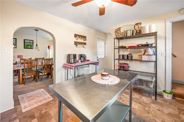 dining area with ceiling fan