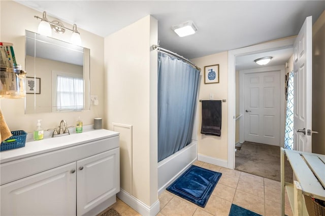 bathroom featuring shower / bathtub combination with curtain, tile patterned flooring, and vanity