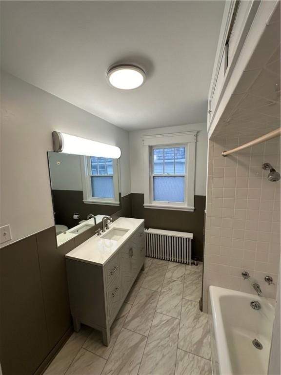 bathroom featuring vanity and radiator