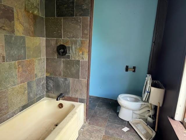 bathroom featuring toilet