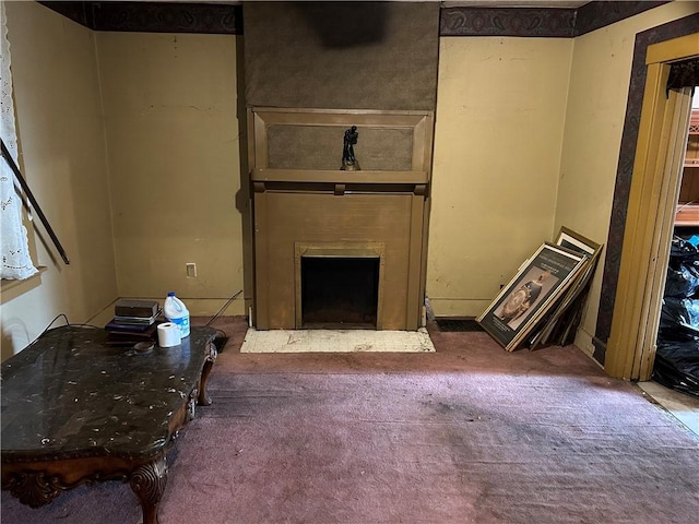 living room with dark carpet