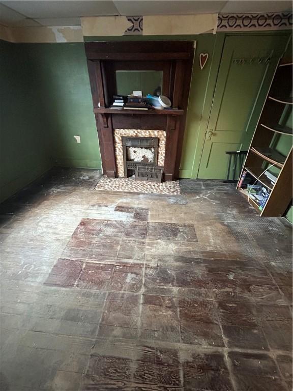 unfurnished living room with a fireplace