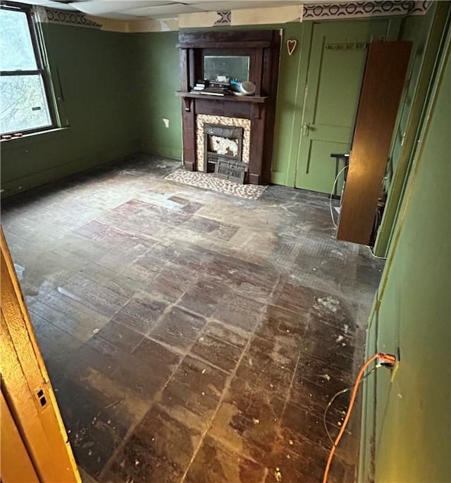 unfurnished living room with a fireplace