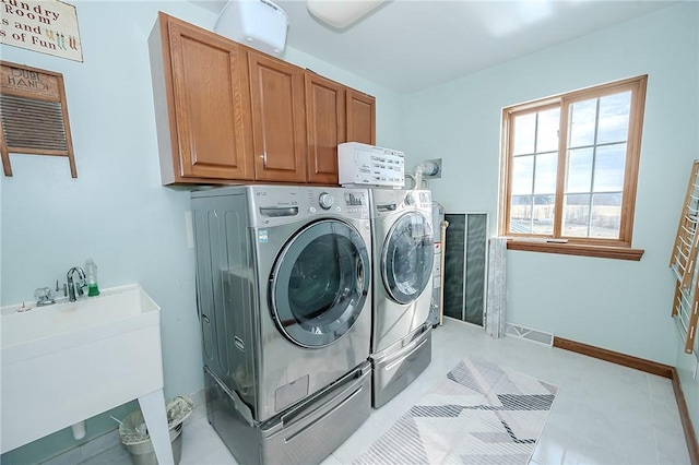 585 State Route 2007, Cowanshanock Twp, PA 16201 - laundry area with washing machine and clothes dryer and cabinet space