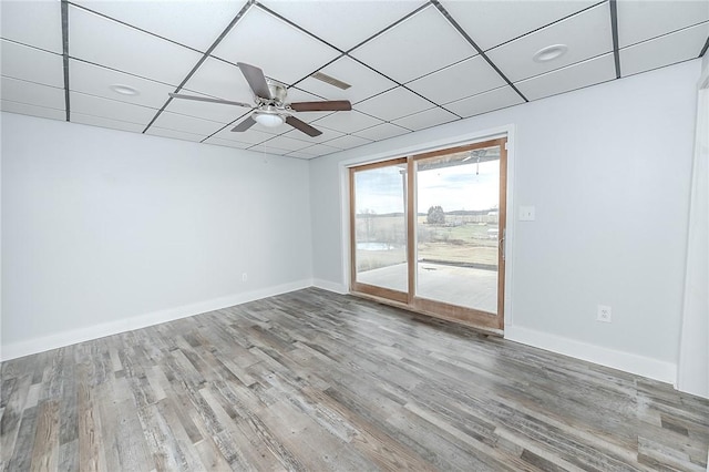 585 State Route 2007, Cowanshanock Twp, PA 16201 - empty room with wood finished floors, a ceiling fan, and a drop ceiling