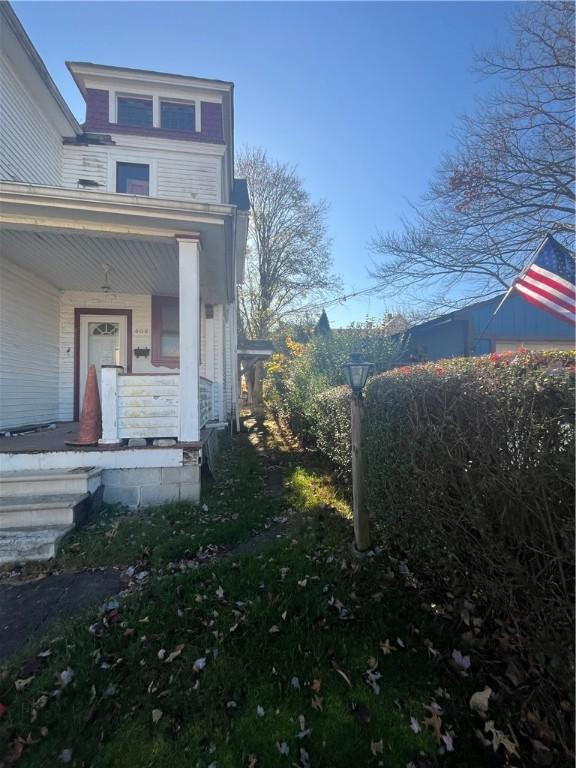 view of home's exterior featuring a porch