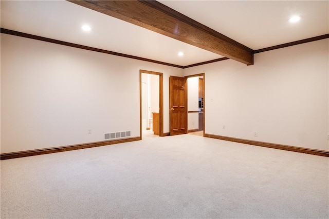 carpeted spare room with beamed ceiling and crown molding