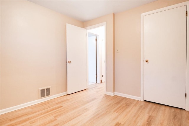 unfurnished bedroom featuring light hardwood / wood-style flooring