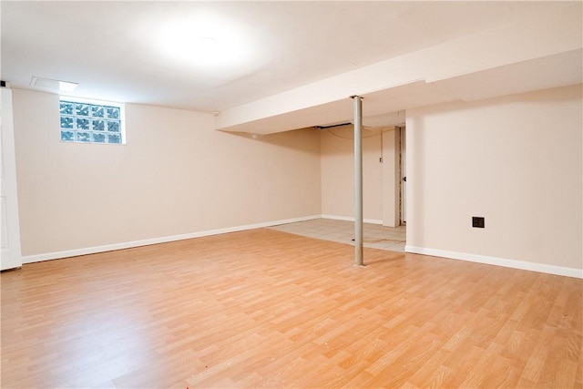 basement with wood-type flooring