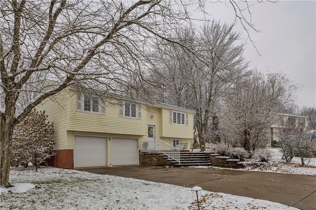 split foyer home featuring a garage