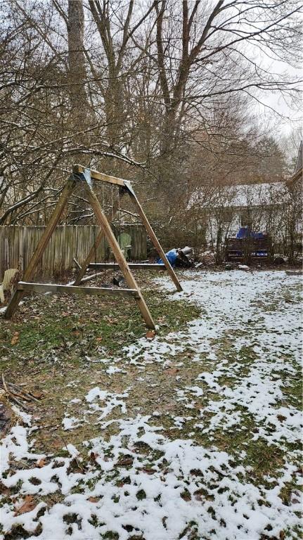 view of yard covered in snow