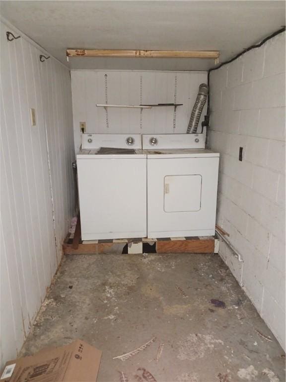 laundry area featuring washing machine and clothes dryer