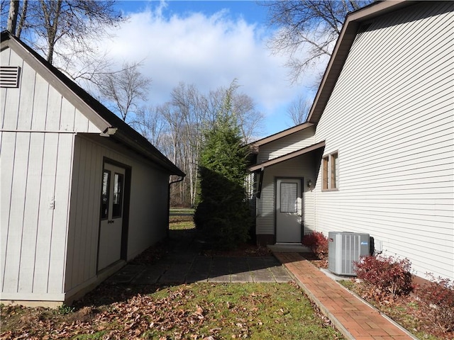 view of home's exterior featuring cooling unit