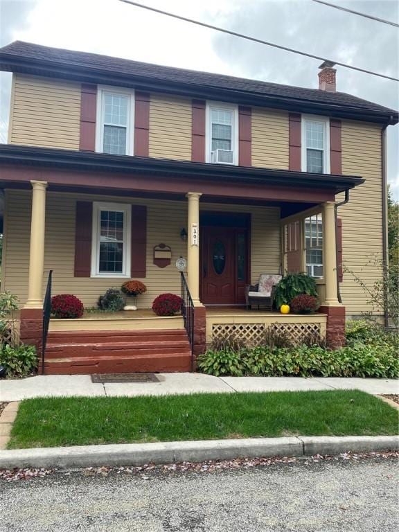 view of front of house with covered porch