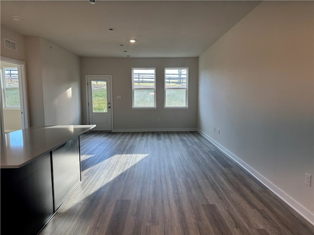 interior space featuring dark wood-type flooring