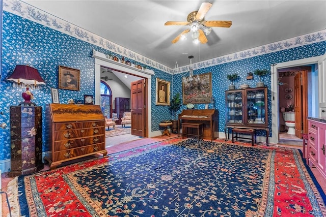 sitting room featuring ceiling fan