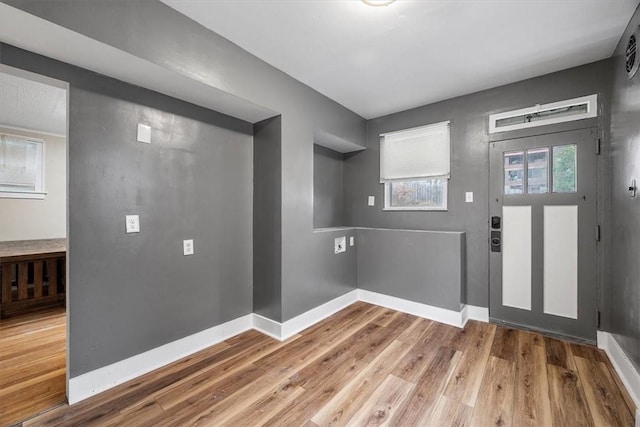 entryway featuring wood-type flooring