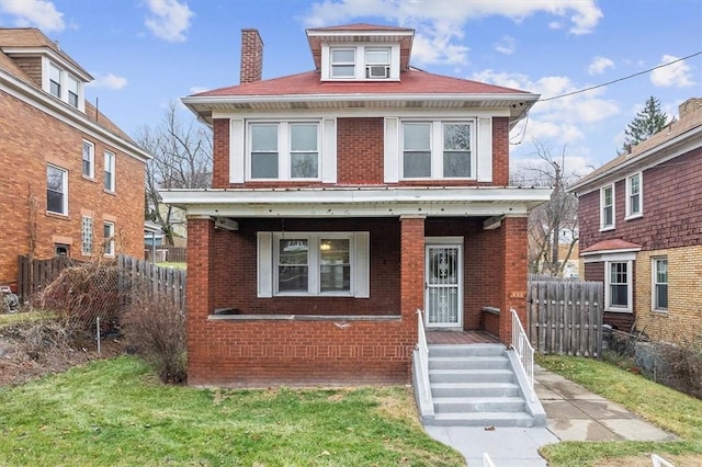 view of front of house with a front yard