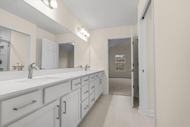 bathroom featuring tile patterned floors and vanity