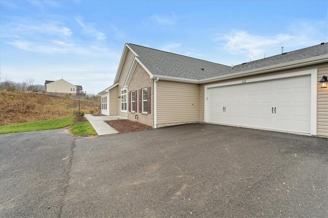 view of home's exterior featuring a garage