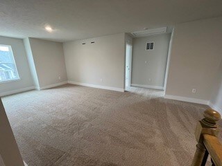 empty room with carpet floors