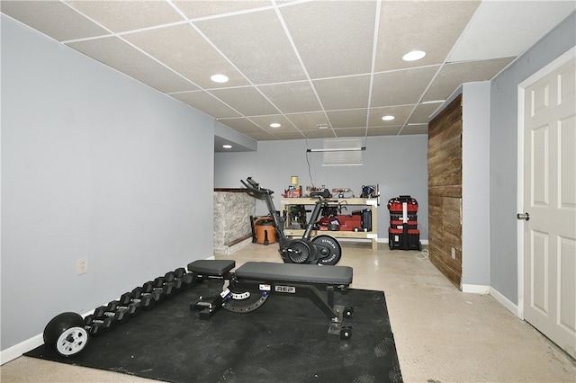 exercise room with a paneled ceiling