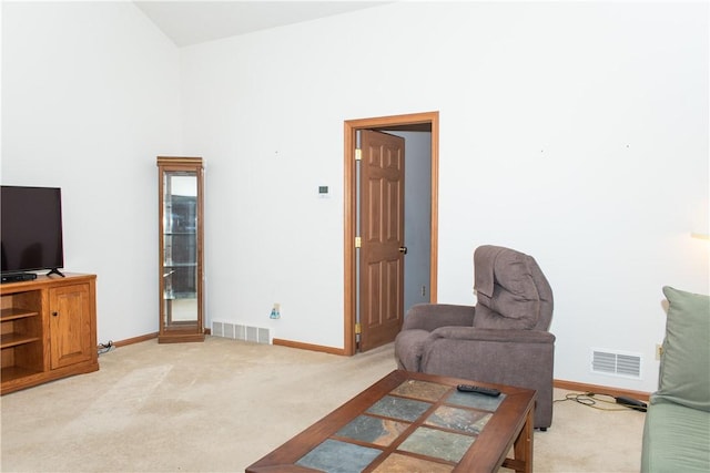 living room with light colored carpet