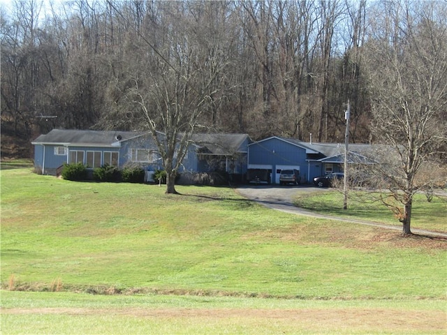 view of front of home with a front yard