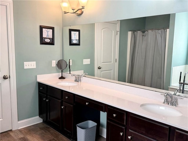 bathroom featuring vanity and hardwood / wood-style flooring