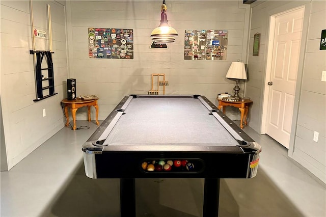 game room with concrete floors and pool table