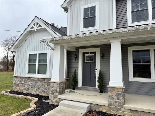 property entrance featuring covered porch