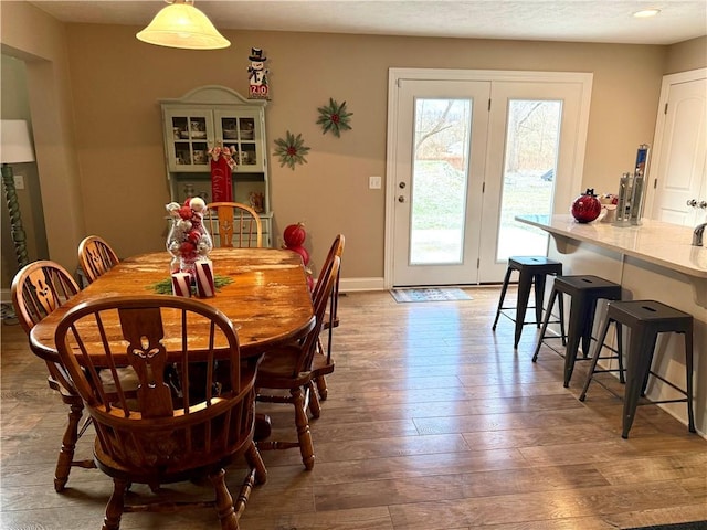 dining area featuring hardwood / wood-style flooring