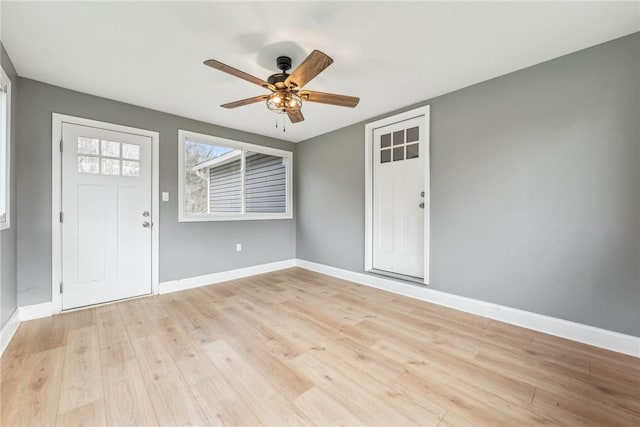 entrance foyer featuring ceiling fan and light hardwood / wood-style flooring