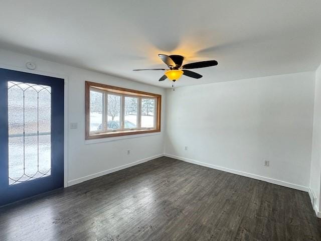 foyer featuring ceiling fan and dark hardwood / wood-style flooring