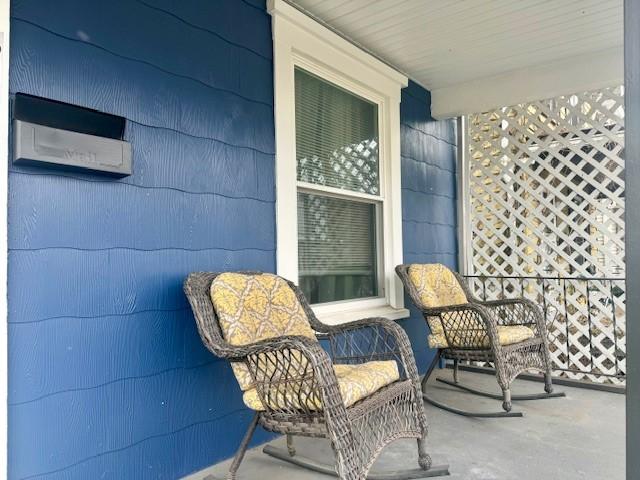 balcony featuring a porch