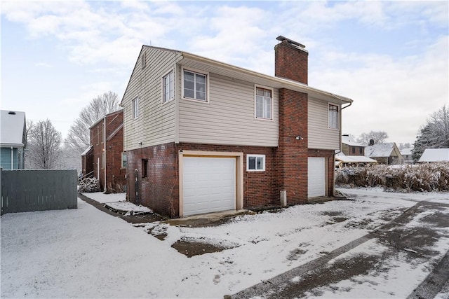 view of snow covered house