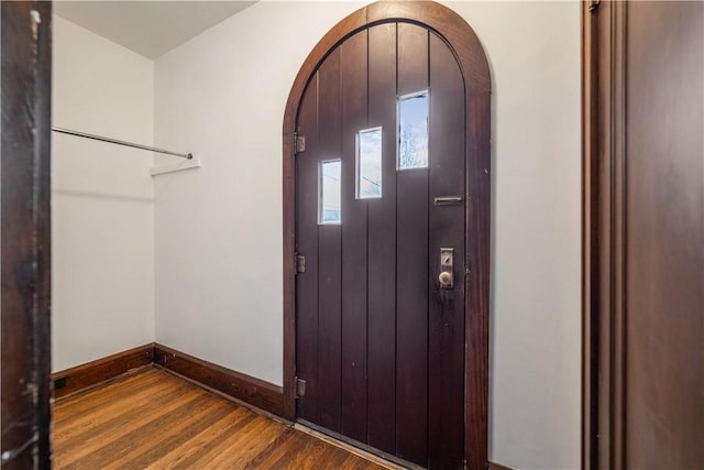 entrance foyer featuring dark wood-type flooring